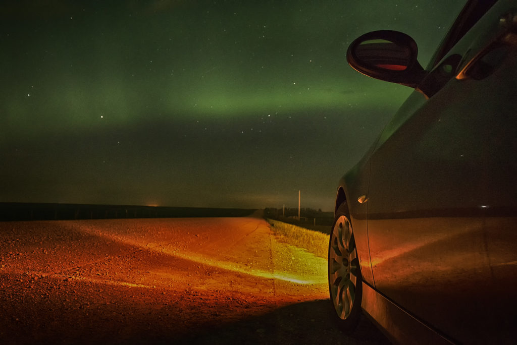 BMW car with aurora in the distance