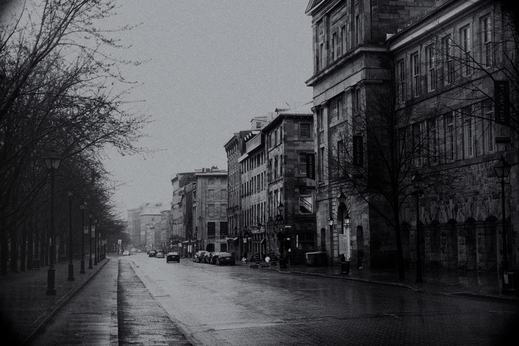 rainy old montreal street in black and white