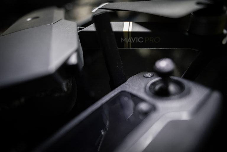 Aerial drone camera featuring the Mavic Pro branding, showcasing advanced drone technology.