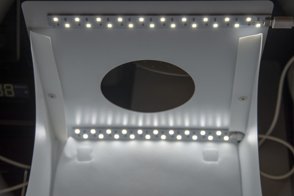 LED light strips on mini portable light box